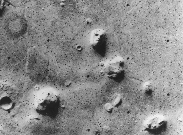 Here is the classic face on Mars. It is creepily realistic though.