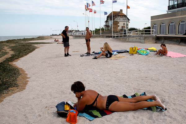 This woman is sunbathing where many German troops were captured.