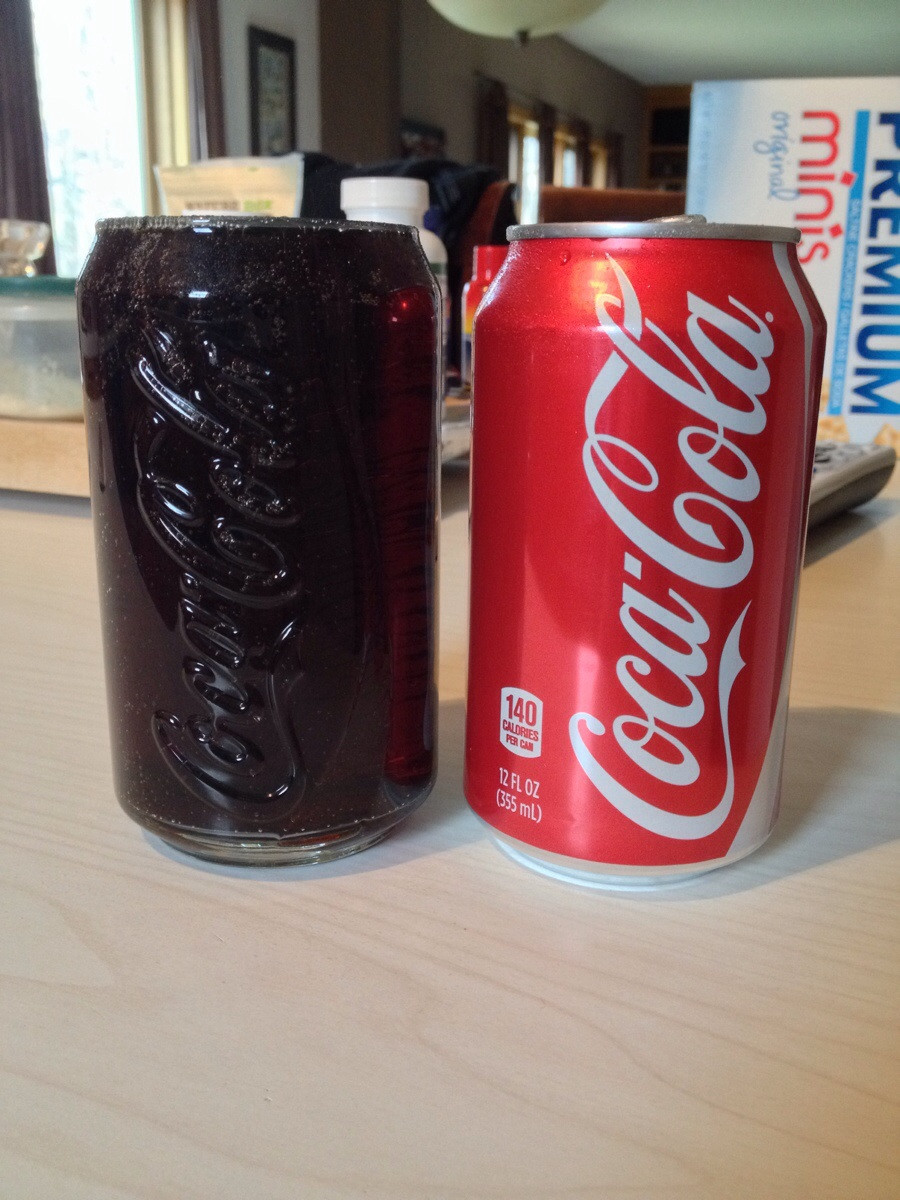 1. A can of soda that fit perfectly into a cup.