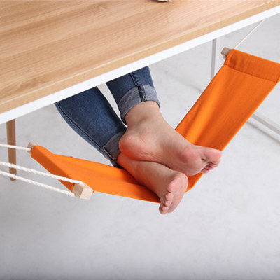 10. Stay relaxed with this under-the-desk foot hammock.