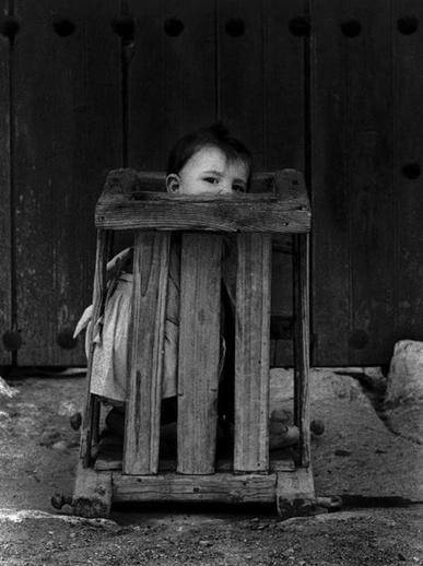 This 1961 picture is from an asylum in Spain. It appears to be some form of cruel punishment.