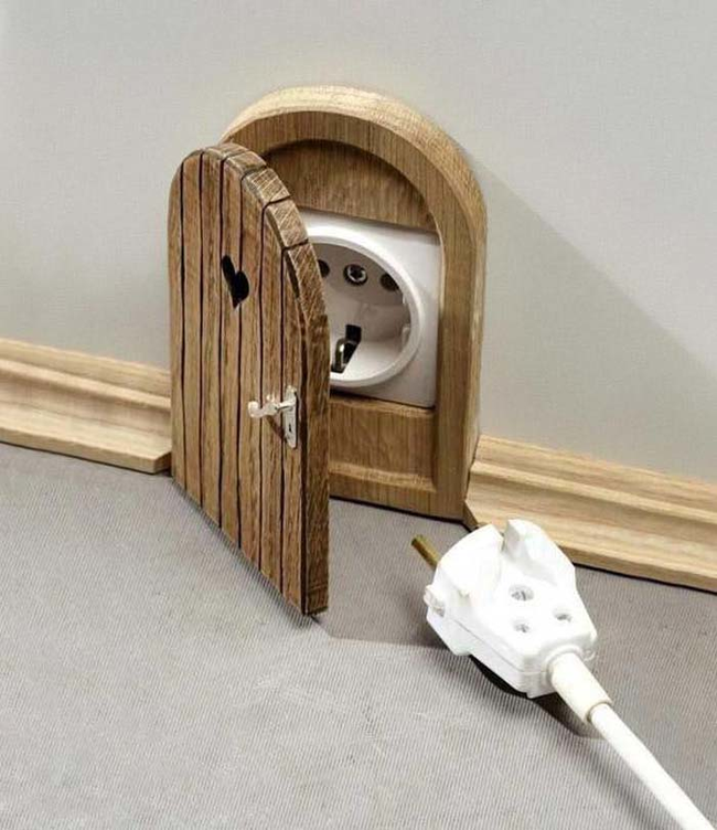 12.) Mouse hole power outlet cover.