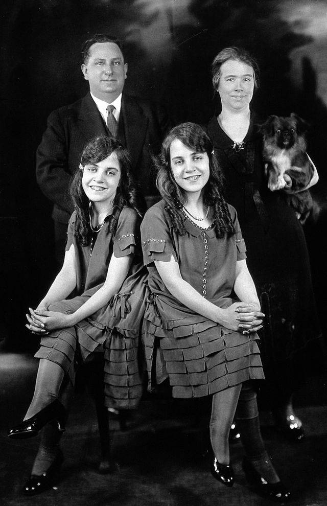 Daisy and Violet were born back-to-back in Brighton, England, to an unwed mother. Their deformity made their mother afraid, and she refused to feed them. They were adopted by Mary Hilton, their mother's employer at a bar. Mary started allowing bar regulars a peek at the girls conjoined flesh for a price.