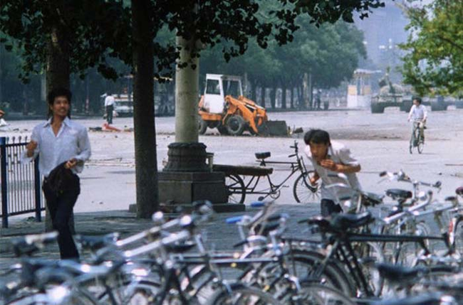 4.) 1989 - The Tank Man in Tiananmen Square, China. He's to the left of the bulldozer.