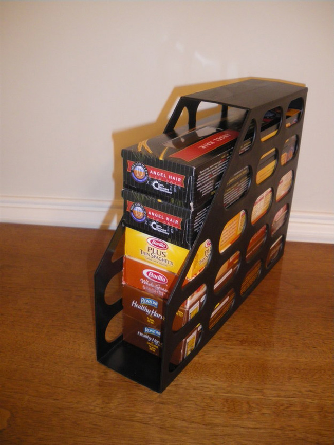 13.) Use a magazine holder to stack pasta boxes.