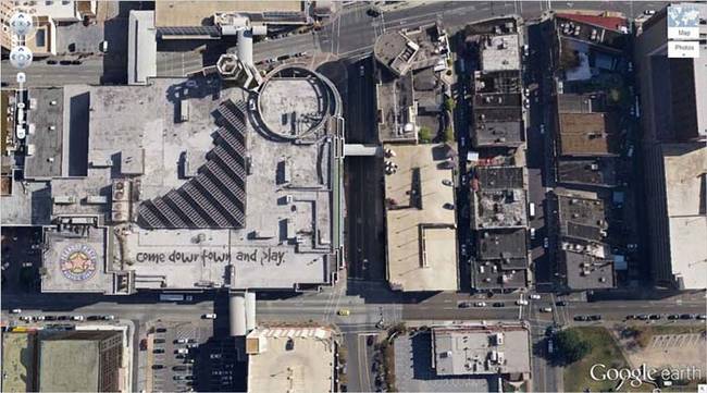 Well that's a creepy thing to write on the roof of a building.