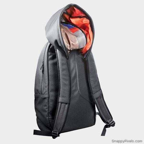 30.) Live in a place with a lot of precipitation? Get this backpack with a built-in hood.