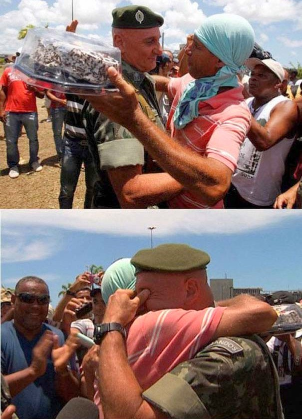 9.) Brazilian protestors bring an officer a cake for his birthday.