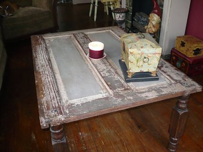15.) Make a coffee table out of an old door.