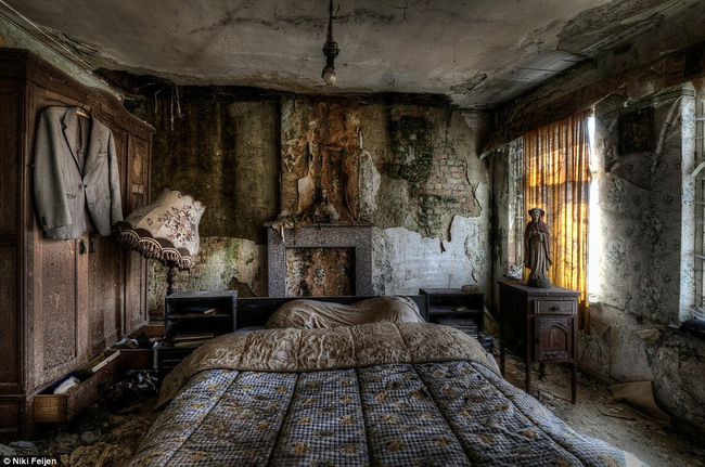 While this home is clearly abandoned, the made bed and the hanging jacket make it just as eerie.