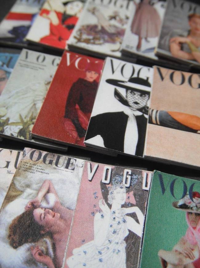 Tiny issues of <i>Vogue</i> with vintage covers.