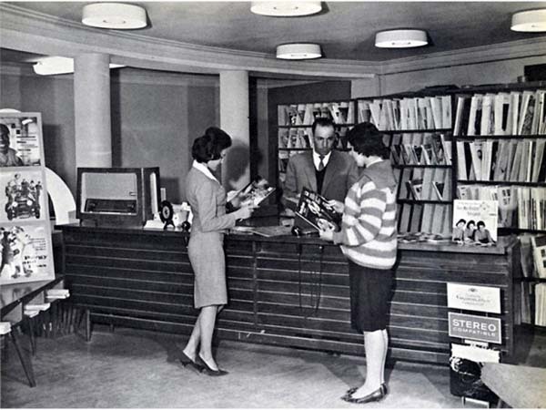 33.) Afghan women, casually dressed, use a public library before the Taliban rule (1950s).