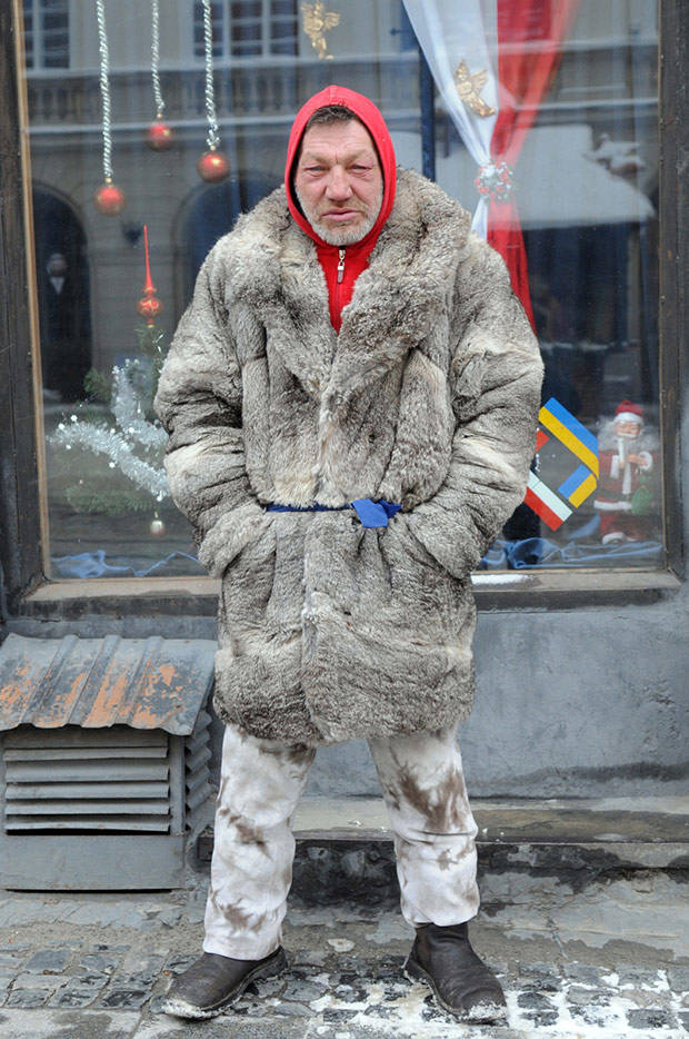 He pulls outfits together from shelters and trash bins.