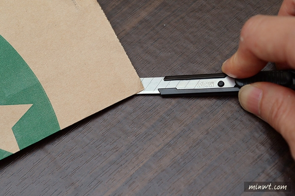 All you need is a pen knife, double-sided adhesive tape and of course, a Starbucks paper bag. With some cutting and folding, a totally awesome product will be completed in about 30 steps.