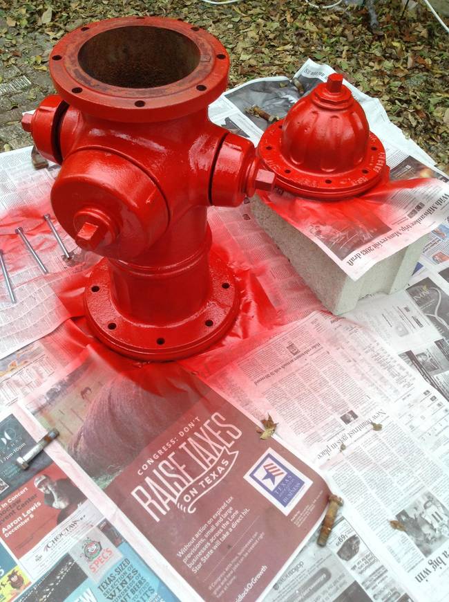 Of course, the fire hydrant had to be paint the traditional fire-engine red. It just wouldn't be the same if it were any other color.