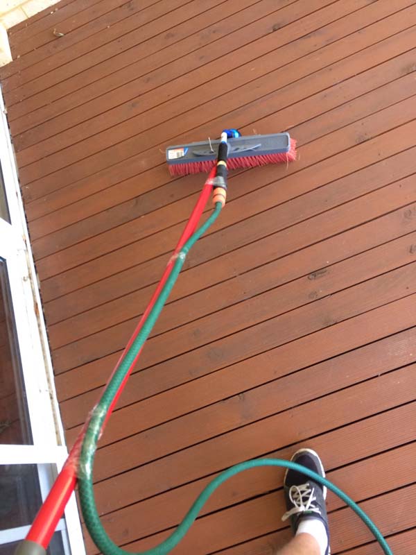 6.) A broom and a hose can help you clean off your dirty deck.