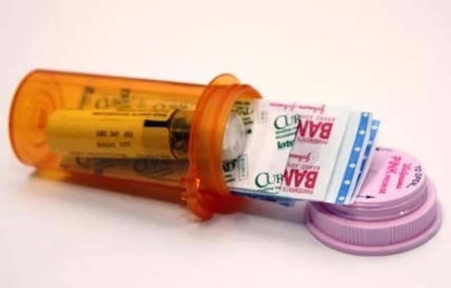 4.) Prescription Bottle Mini First Aid Kit