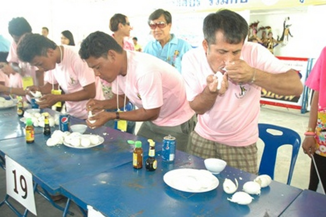 14.) Crocodile Egg Eating Contest.