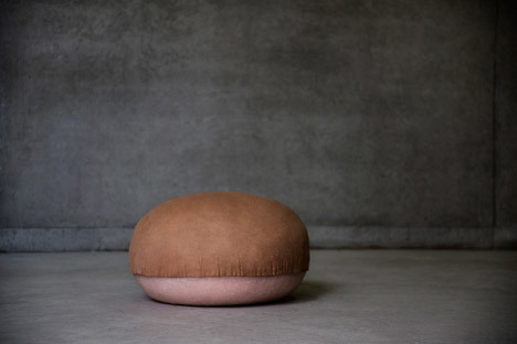 Gigi used molded silicone as a base to create a series of squishy seats designed to mimic rolls of fat. Then she found leather close to human skin in feel and touch to stretch it over the bulbous forms with the suede section facing side up.