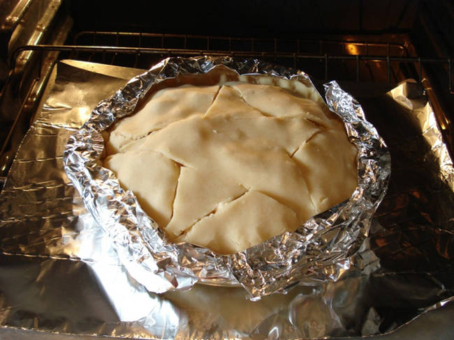 Also use aluminum foil to keep your pie crust from burning.