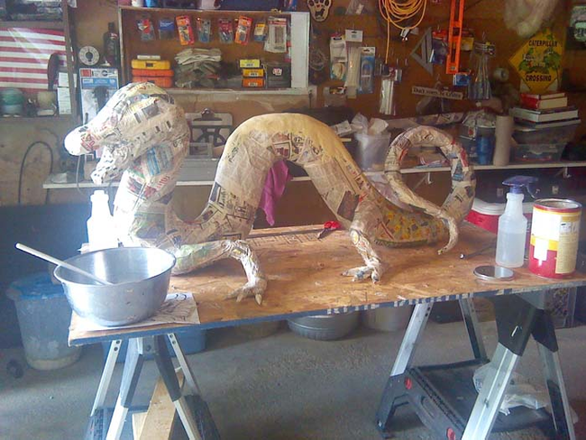 Carefully, she created the dragon's body using wire frames and putty.