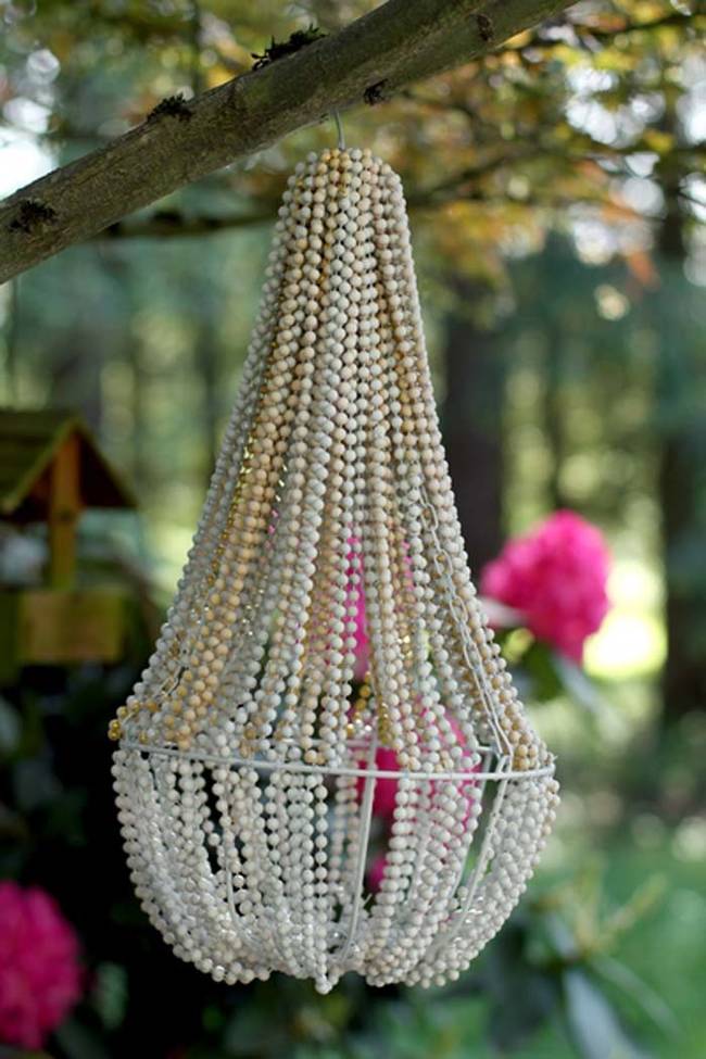 12.) This chandelier is a great outdoor decoration, you'd never guess it's made from Mardi Gras beads!