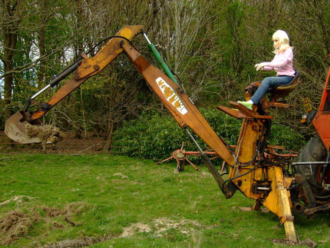 Look at her go! Buy this backhoe or say goodbye to your loved ones!