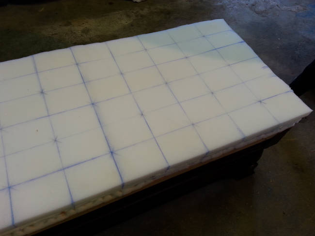 Here's the foam that would be used on the ottoman. It was laid out precisely where the buttons would correspond.