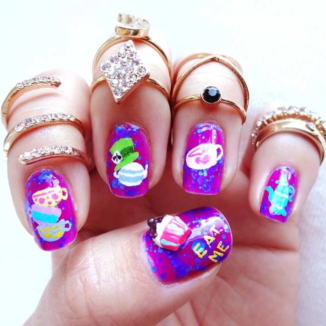 This <i>Alice In Wonderland</i> nail art is totally adorable.