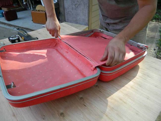 If your suitcase has a divider inside, cut the divider out before starting the project.