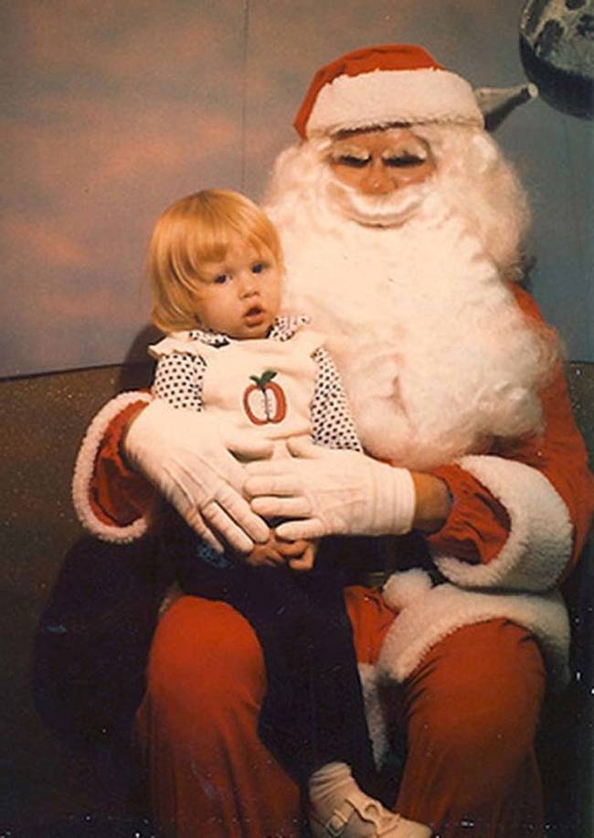 Isn't Santa supposed to be human? Why is this guy wearing a plastic mask?