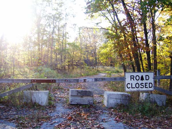 2.) Helltown: The northern part of Summit County in Ohio is called “Helltown.” In the 1970s, Boston Township was the site of a government buyout. There was a mass eviction of its citizens. Now, boarded and burned houses stand alone in the woods. There is a steep drop off at Stanford Road, immediately followed by a dead end. It’s named The End of the World. In Helltown, people have been haunted by hearses, chased by phantom trains, plagued by the stench of a slaughterhouse and terrorized by moving trees.