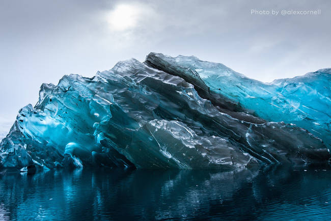 Made of frozen seawater, the ice is almost a tropical blue, only solid.