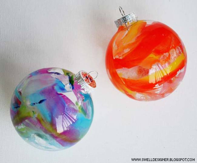 Melt crayons inside a clear ornament for colorful, artistic decorations.