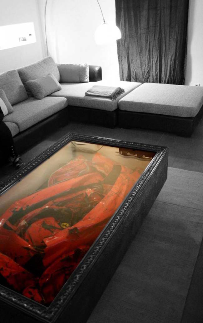 1.) This coffee table is made out of a crashed Ferrari.