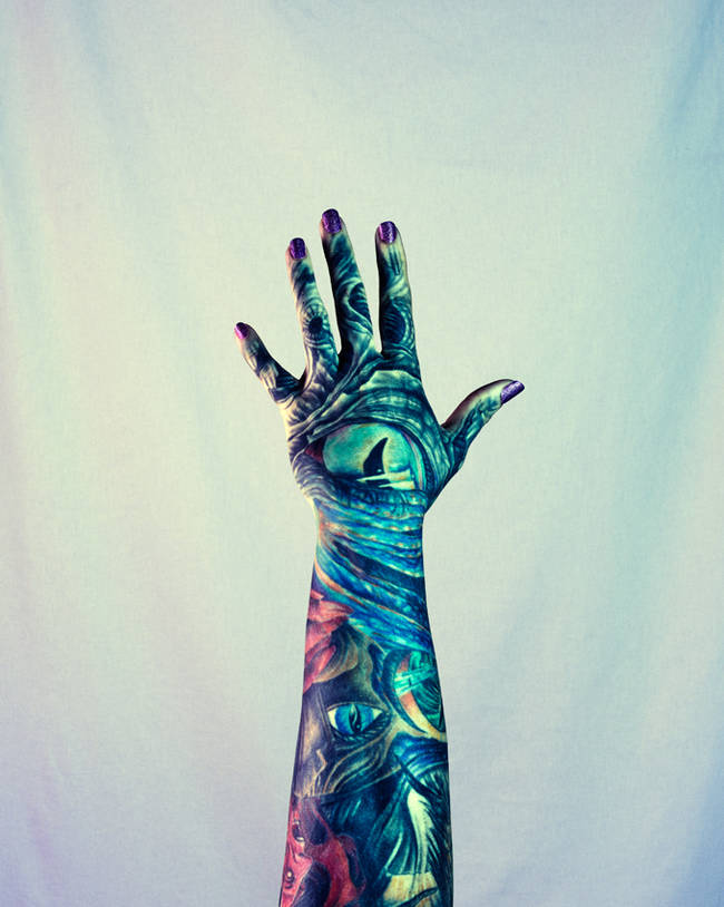 Hand and finger tattoos like this are usually reserved for people who already have large amounts of tattoos, and for some reason, eyes are a popular choice for the back of the hand.