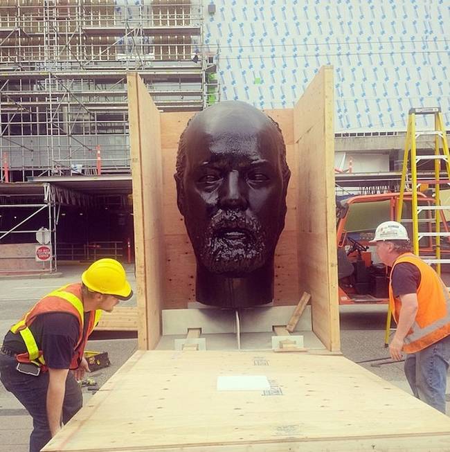 Artist Doug Coupland created this seven foot black, resin, and polyester sculpture of his own head in May.