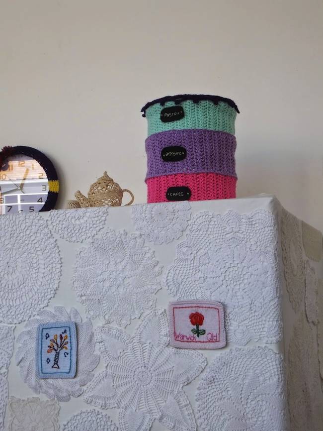 The refrigerator gets a doily treatment.