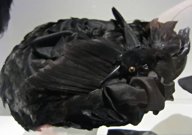 A mourning hat, complete with dead bird, from 1895.