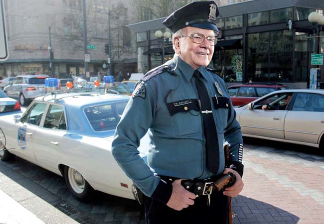 4.) Warren Buffett as a police officer. Net worth: $66.9 billion.