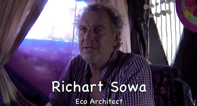 Robert Sawa in his three-story house on the island he built from recycled materials.