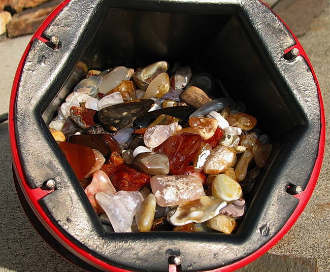 Agate stones in a tumbler.