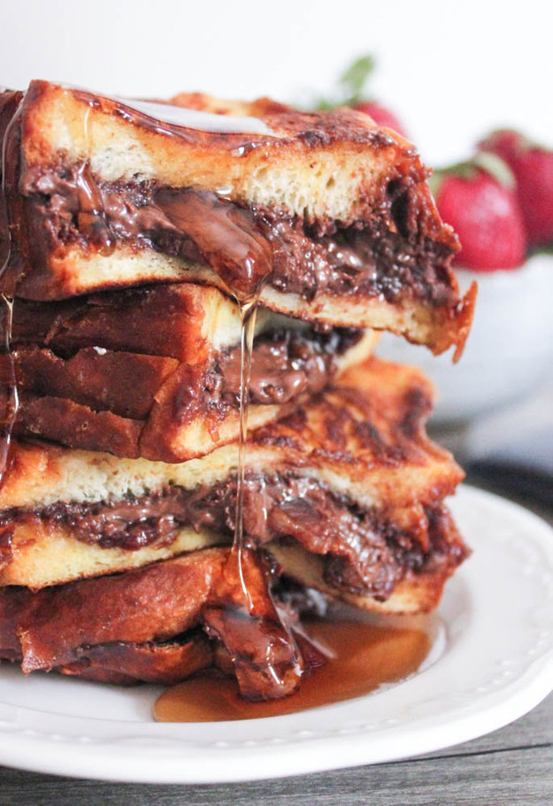 9.) <a href="https://www.domesticate-me.com/nutella-bacon-stuffed-french-toast/" target="_blank">Nutella and Bacon-Stuffed French Toast</a>