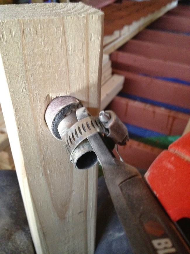 He sanded the inside of the holes in the wood to make sure there weren't any edges that could wear down the rope.