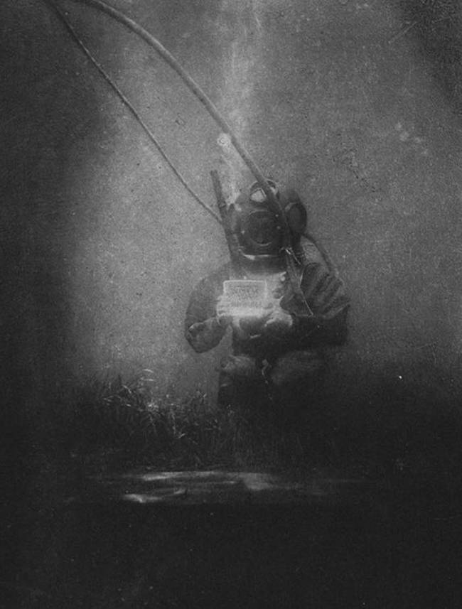 4.) Louis Boutan taking one of the world's first underwater photographs in 1893.