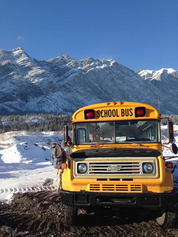 The 1986 Chevy Bluebird school bus cost $3,500 CAD.