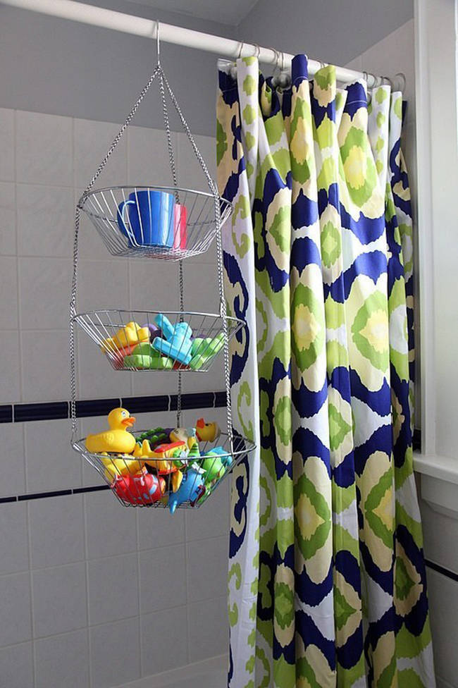 16.) Use a tiered fruit basket to store bath time toys.