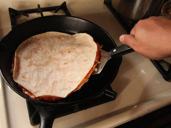 2.) Flip the 'dilla over and cook the other side.
