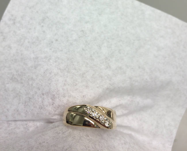 The restored wedding ring looks just like new!