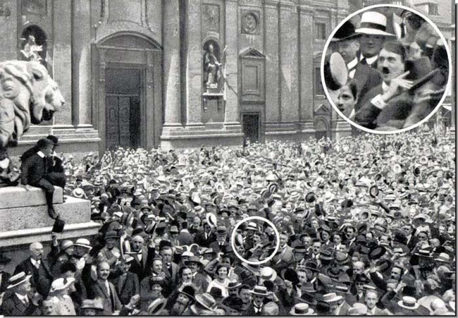 16.) 1914 - Young Adolf Hitler celebrating the announcement of World War One.